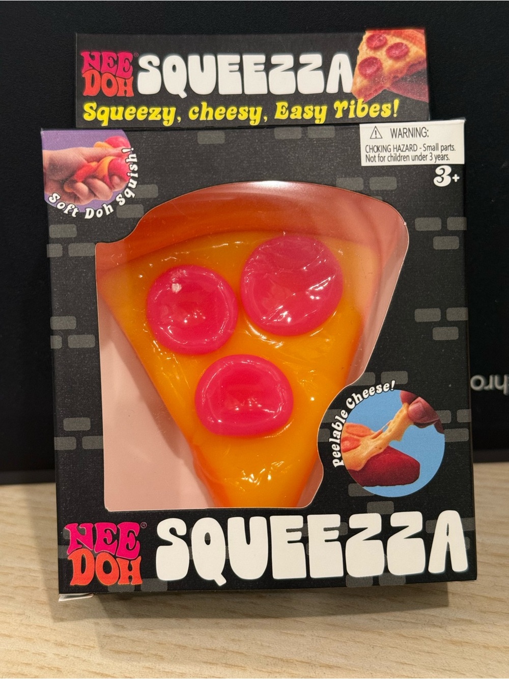 Squeezza Pizza Slice Toy - Orange with Pink Toppings